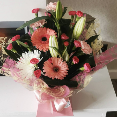 Sweet Escape - A lovely in water presented in a gift box/bag. Created using all pink flowers with complimentary foliage. Hand delivered with care by the Flower Studio Rochdale.